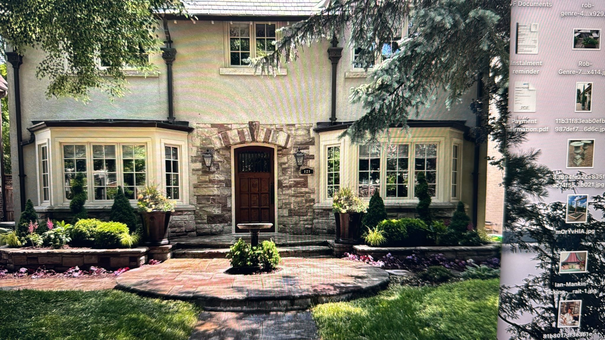 Vetiver Living – garden design and installation in Toronto, ON: professionally landscaped outdoor garden with mixed foliage and decorative planters